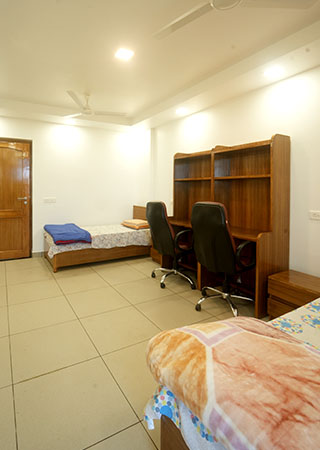 spacious rooms girls hostel near UPES