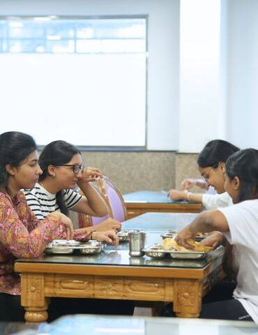 Students Having Food at Royal Palace Girls Hostel